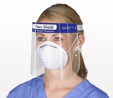 Medical Doctor Wearing Protective Mask and Face Shield