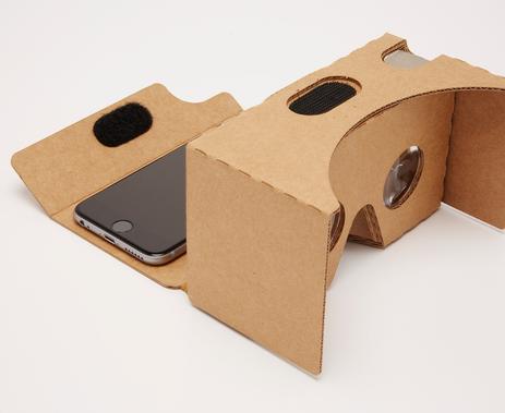 A box shaped Virtual Reality Glasses with a phone inside it