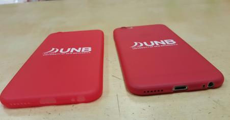 A dunb labeled apple back cover in red color