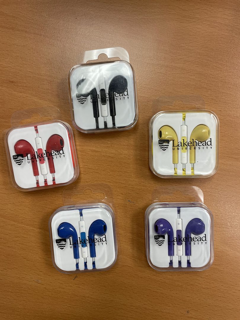 Ear Pods of Three Different Colors in Plastic Cases