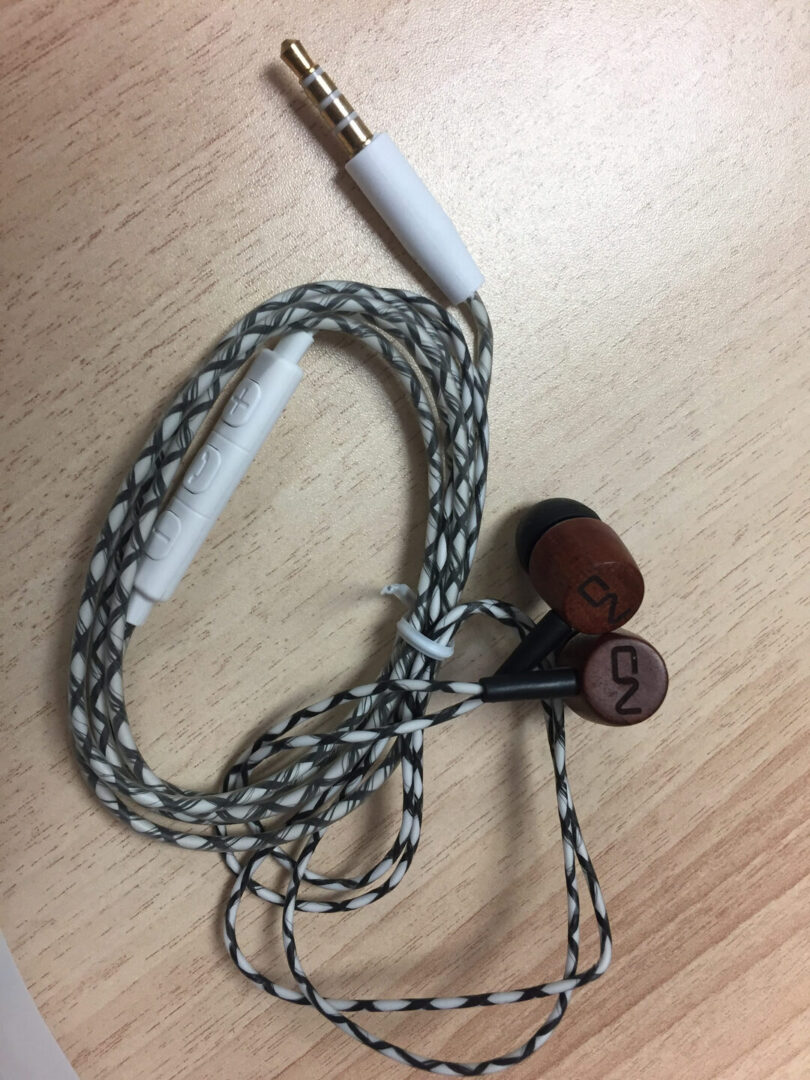 A Black and White Thread Cover Headphones Bunch