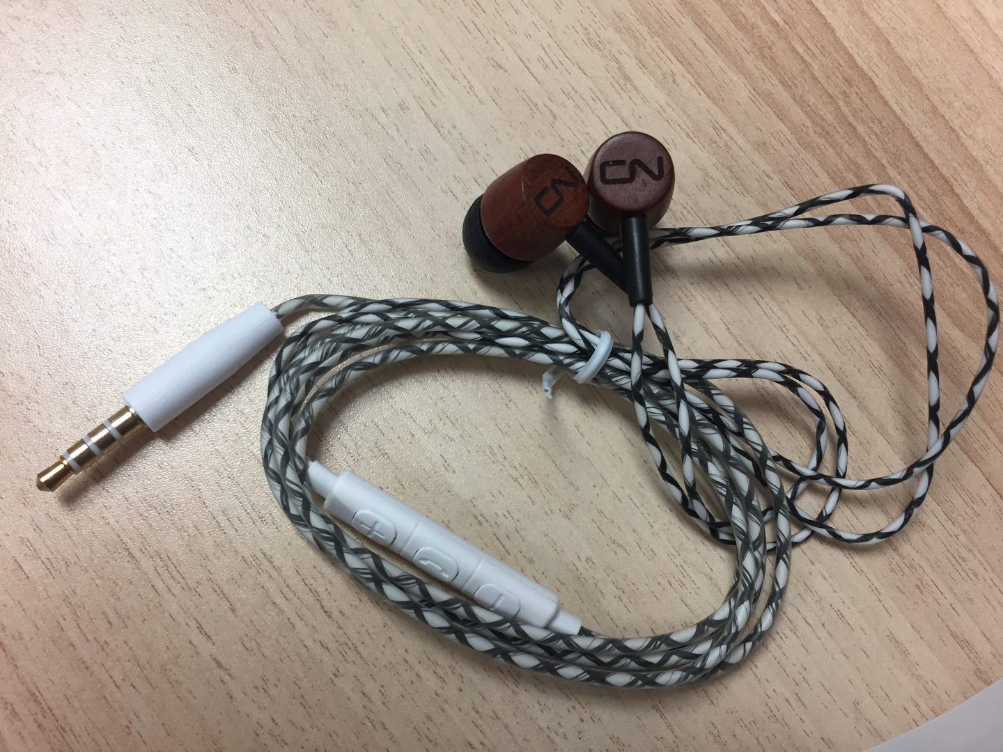 A Black and White Thread Cover Headphones Bunch