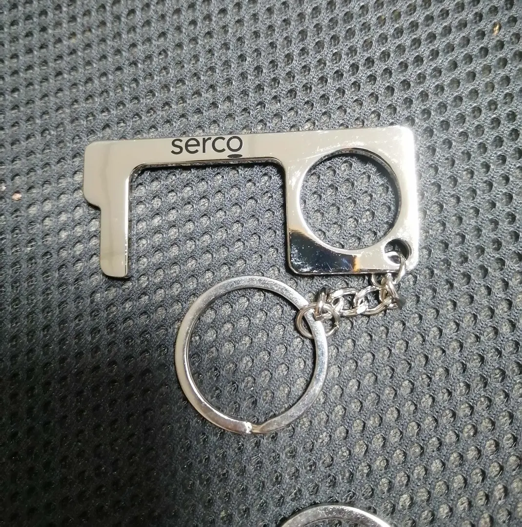 A Hands Free Bottle Opener With a Key Chain