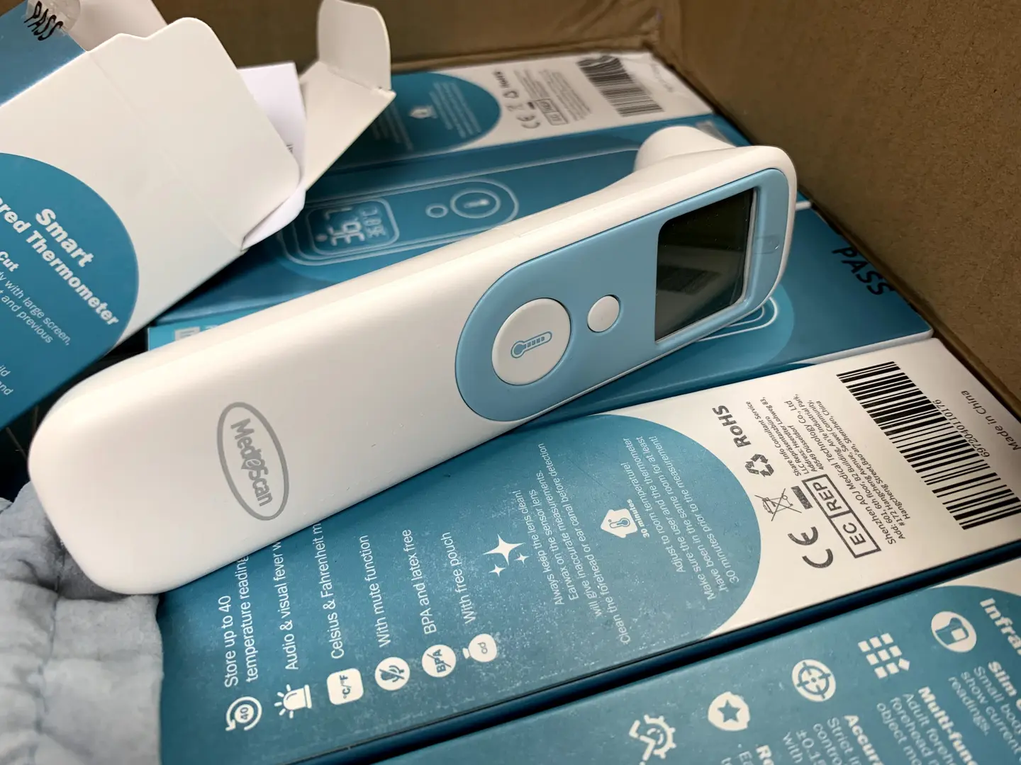 A Non Contact Thermometer With a Box