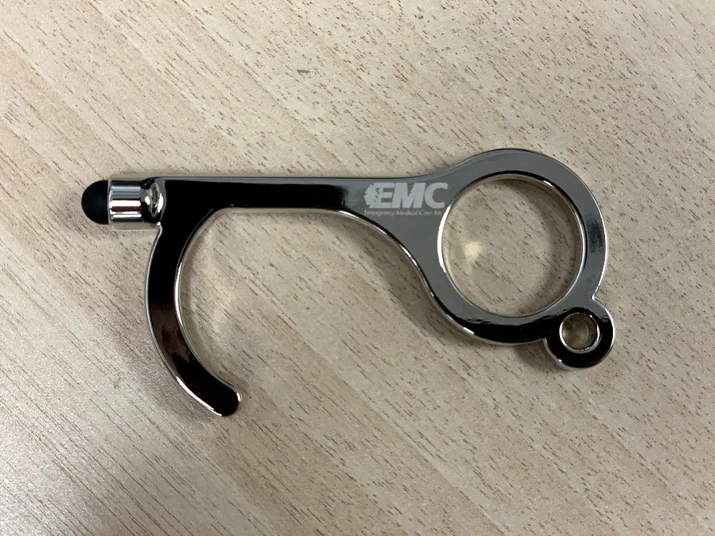 A Metallic Bottle Opener With a Finger Hole