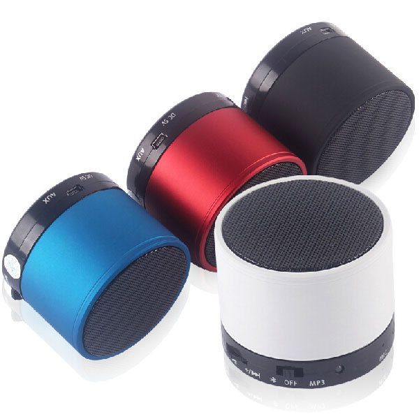 Four different color speakers kept together