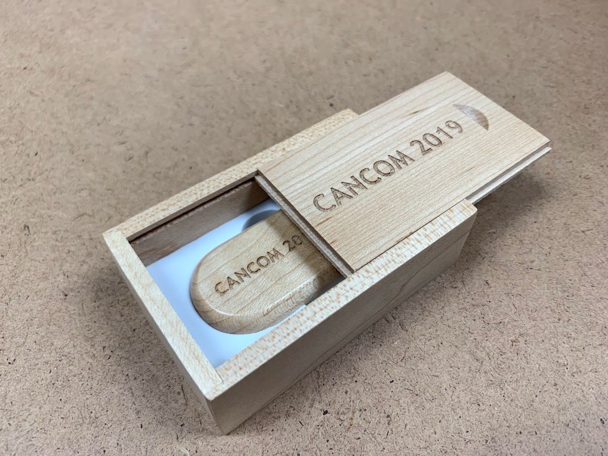 A Cancom 2019 in a Wooden Box