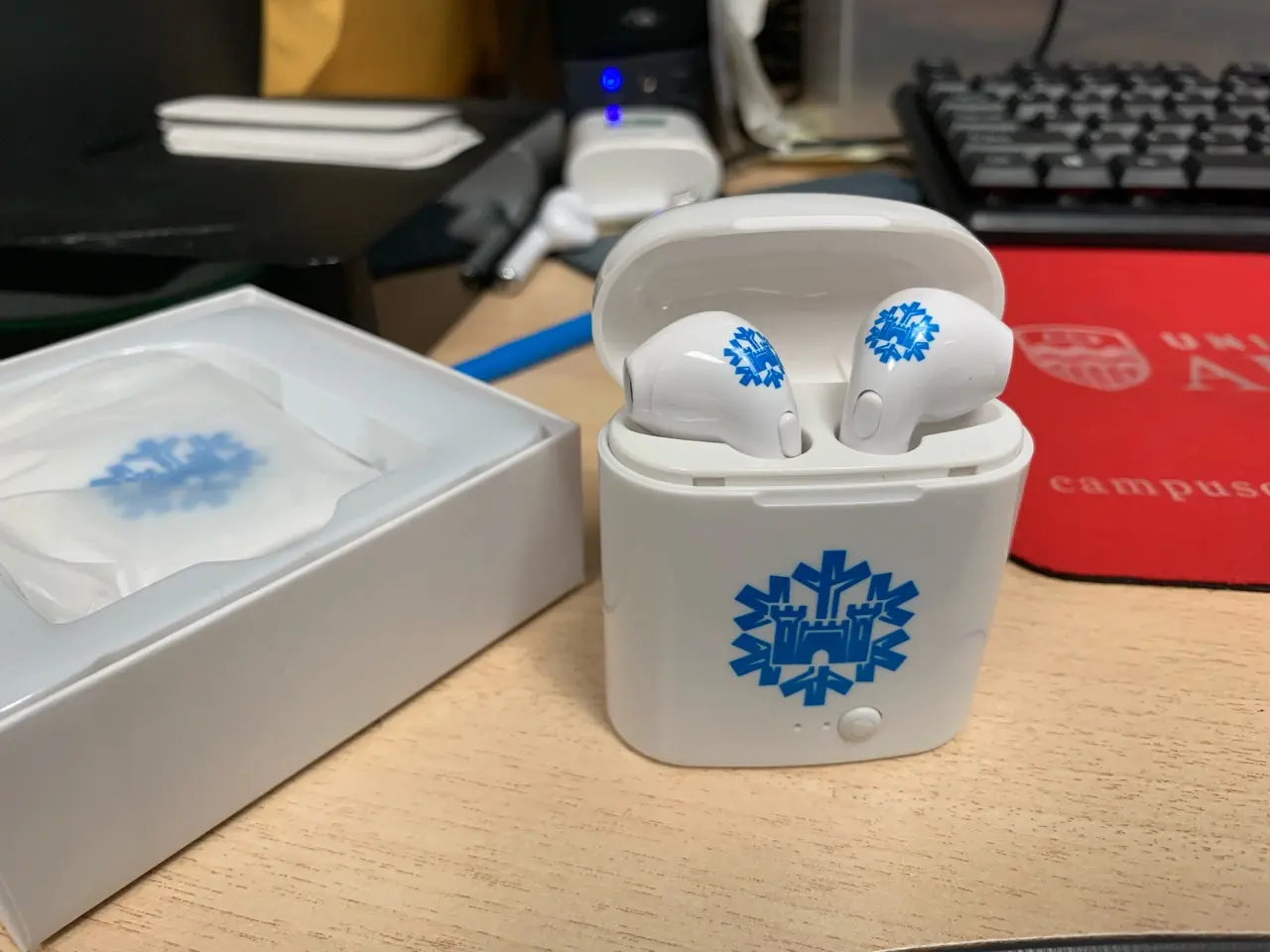 An Ear Pods With Snow Flake Pattern in Blue