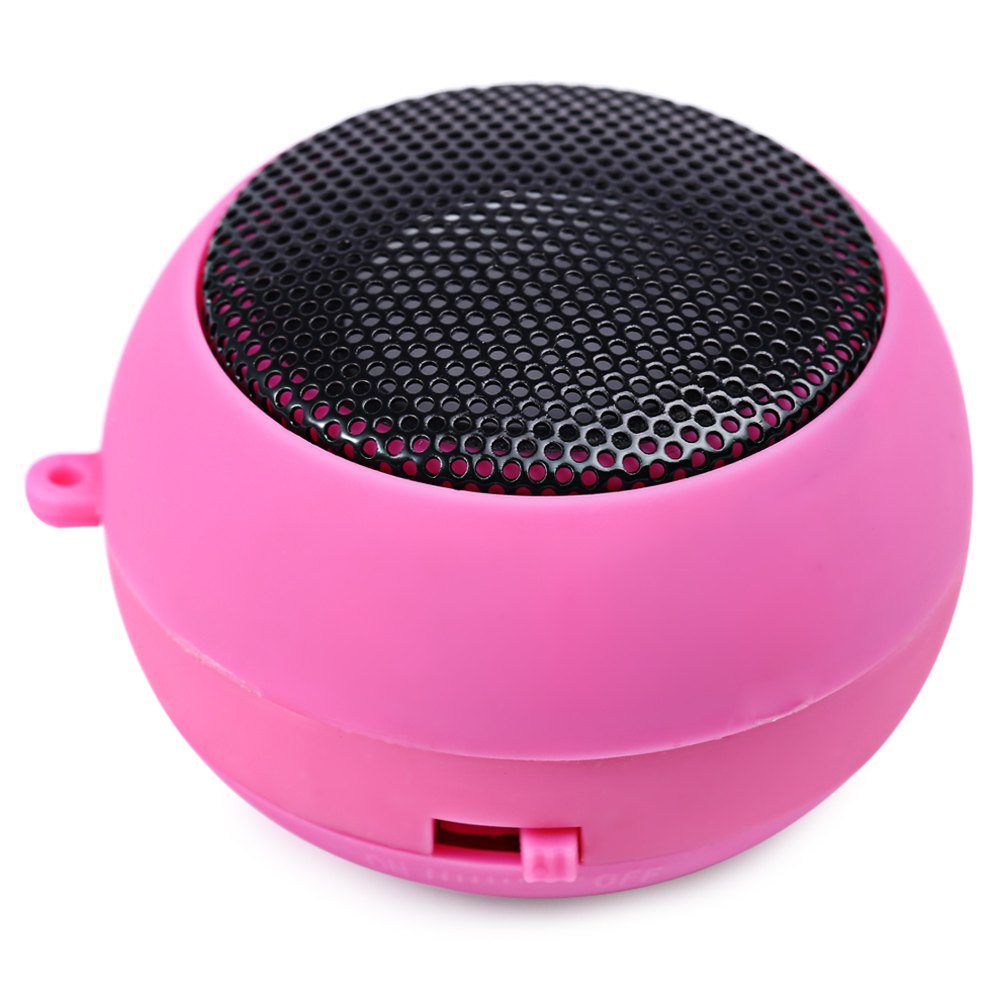 A pink color speaker with a white background