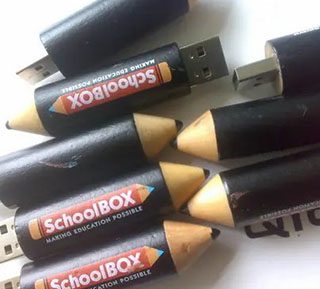 Eight pencil shaped wooden USB drives