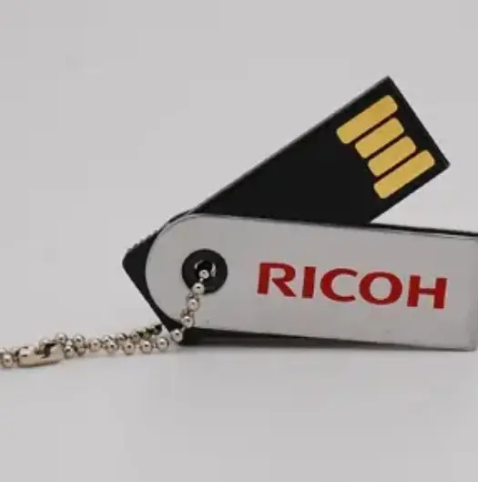 Close shot of USB with the RICOH logo