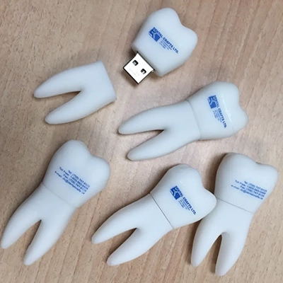 Tooth shape Novelty USB Drives Placed on the desk