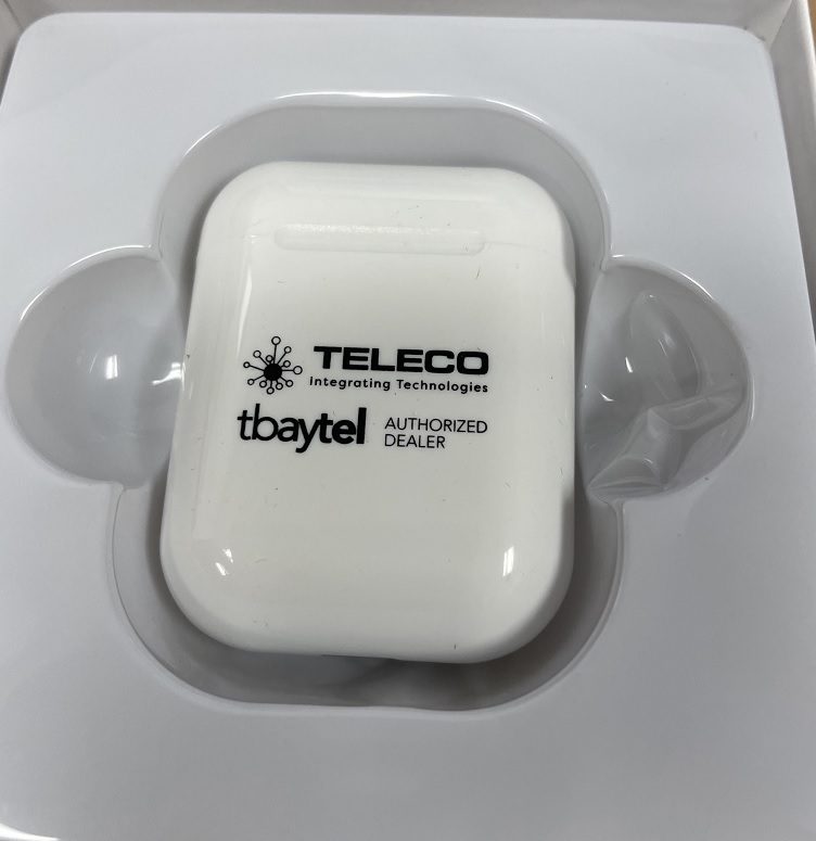 A teleco labeled earpod inside its civer