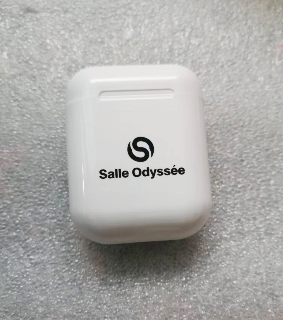 A Sally Odyssee Ear Pods in White Color